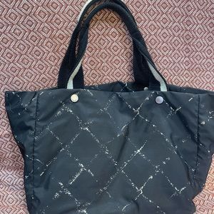 AuthenticVintageCHANELTravelLineToteBlack
w/coinpurse serial number 6204160